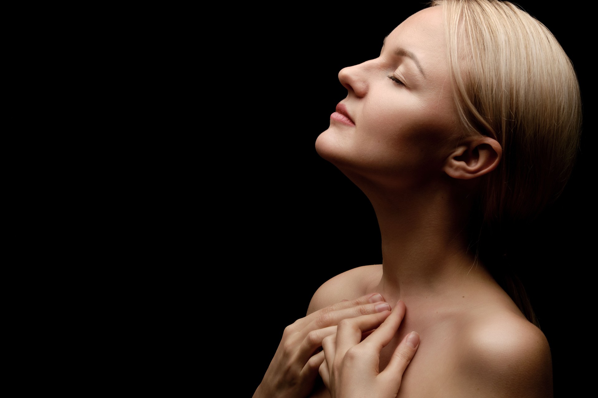 topless woman on black