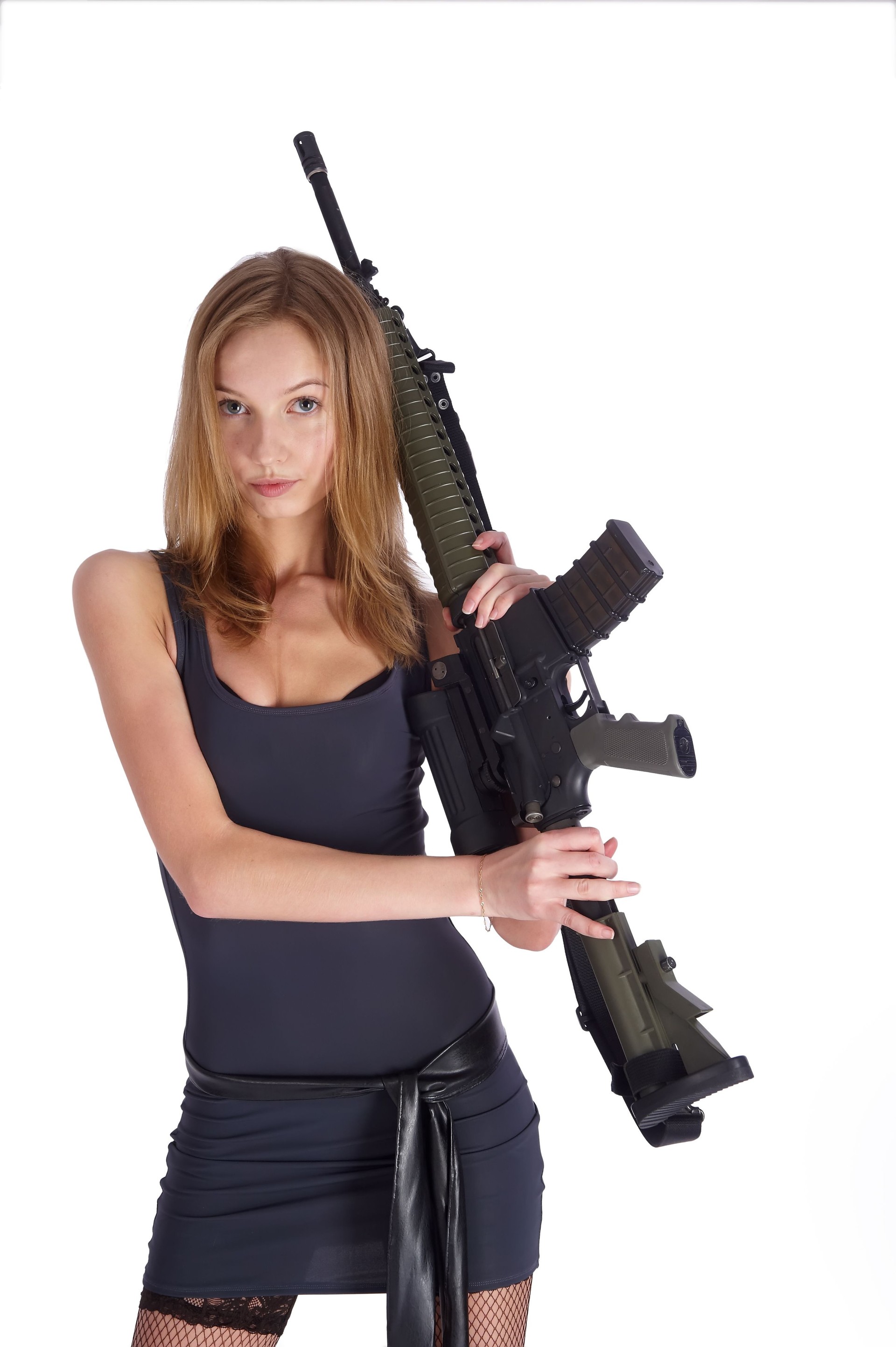 Woman with gun on white